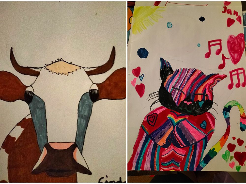 Links neben ein braun-weißer Ochse mit ruhigem Gesichtsausdruck, rechts eine farbenfrohe Katze mit bunten Streifen und Herzsymbolen